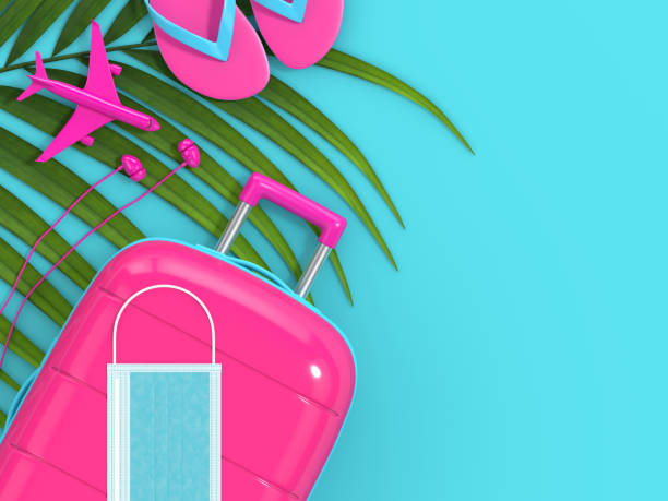 istock 3d render of suitcase, beach stuff and  protective mask 1266903471