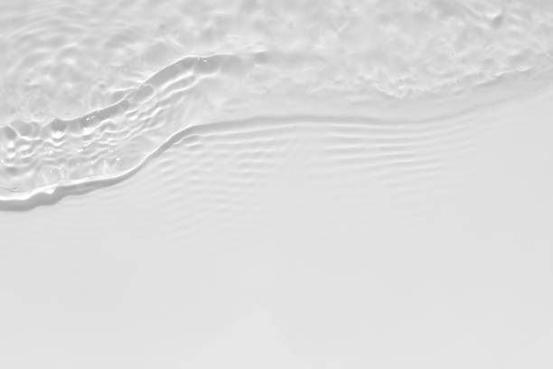 istock desaturated transparent clear calm water surface texture 1266911810