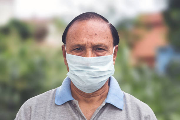 istock Man wearing a face mask during coronavirus outbreak 1266914720
