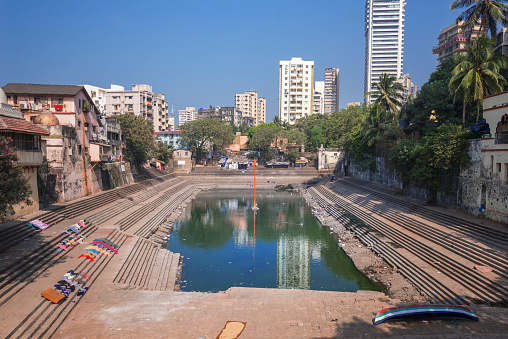 Mumbai. India. Banganga tank ancient water tank in walkeshwar, Mumbai Malabar Hills distric. The lake is sacred to hindus