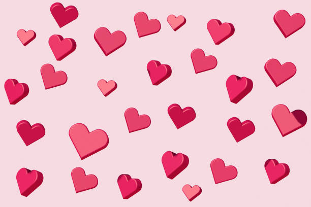 istock Heart Shapes on Pink Background 1266919892
