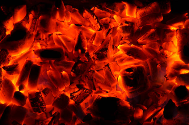 istock Burning coal background, close up of red burning coal 1266921601