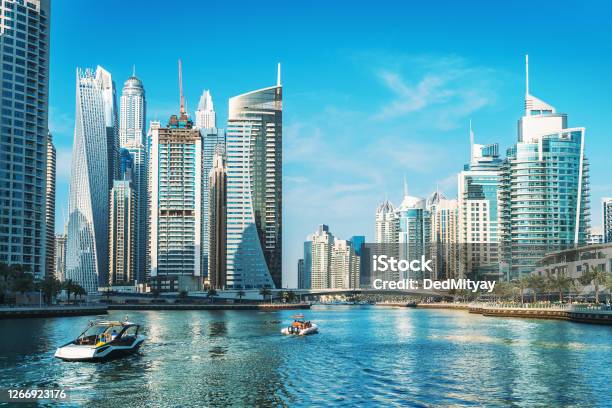 Panorama Of Dubai Marina In Uae Modern Skyscrapers And Port With Luxury Yachts Stock Photo - Download Image Now