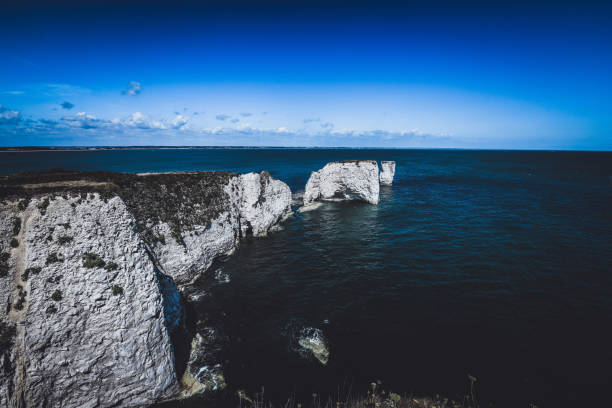 Majestic Harry Cliffs Above The Sea At Jurassic Coast, UK