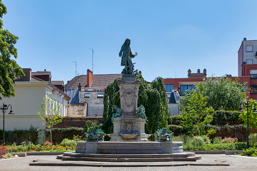 The Monument to Watteau by sculptor Carpeaux was inaugurated in 1884 in front of the Saint-Géry Church in Valenciennes, Hauts-de-France.
