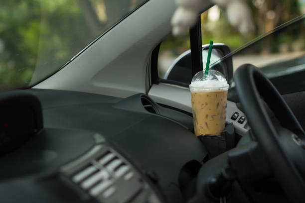 istock Tack out coffee in car 1266929011