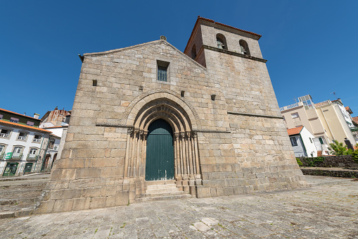 LAMEGO, PORTUGAL - CIRCA MAY 2019: The Church of Santa Maria de Almacave, in the city of Lamego is a 12th-century Portuguese Romanesque monument, later altered in the 17th century, which subverted part of its primitive and austere Romanesque volumetry.