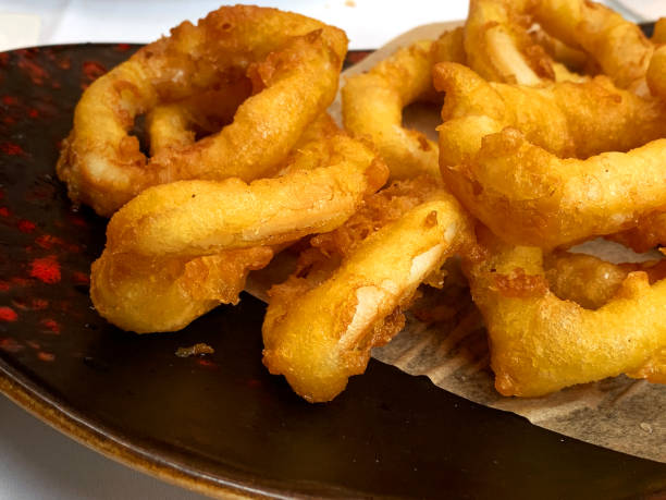 istock A plate with calamares a la romana, a typical spanish meal made with squid rings battered and fried 1266930213
