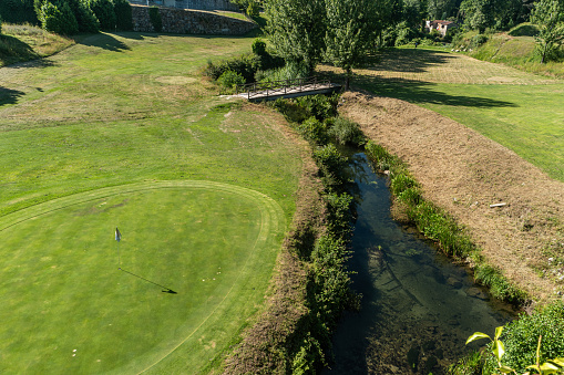 FAFE, PORTUGAL - CIRCA JUNE 2020: View from the public bridge of Golf Course of Rilhadas, Fafe - Portugal. Golf is a outdoor activity with thousands of enthusiasts nationwide.