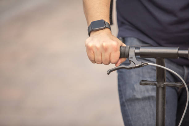 istock Businessman on thr street with kick scooter 1266933880
