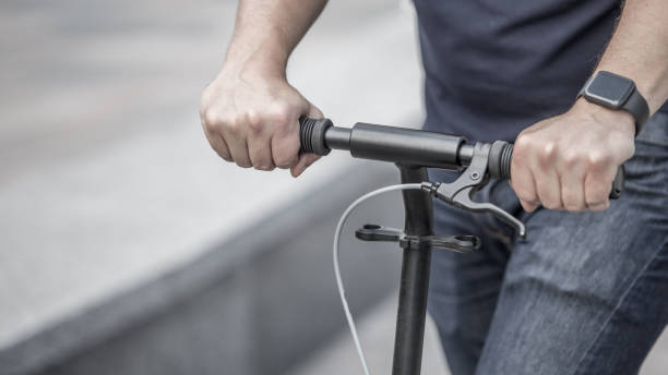 istock Businessman on thr street with kick scooter 1266933887