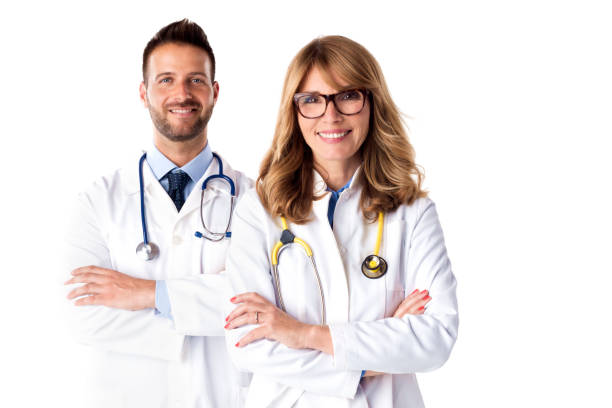 istock Medical team standing at isolated white background 1266933897