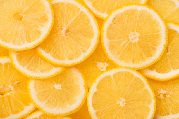 istock top view of sliced fresh and ripe yellow lemons 1266934009