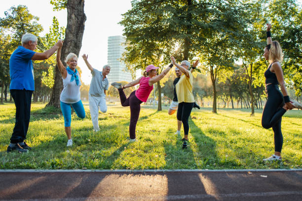 istock Senior people are exercising with instructor 1266937869