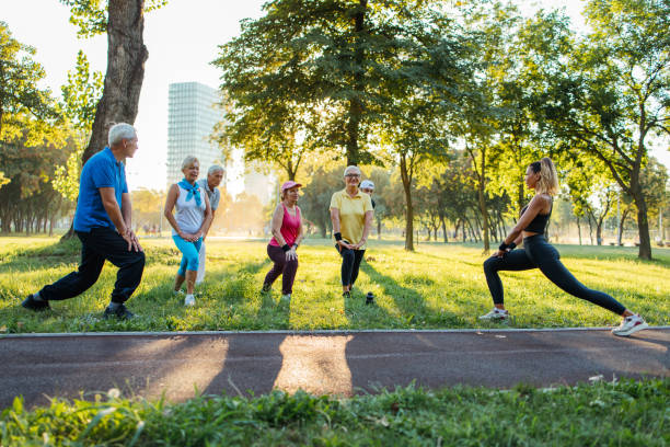 istock Senior people are exercising with instructor 1266937889