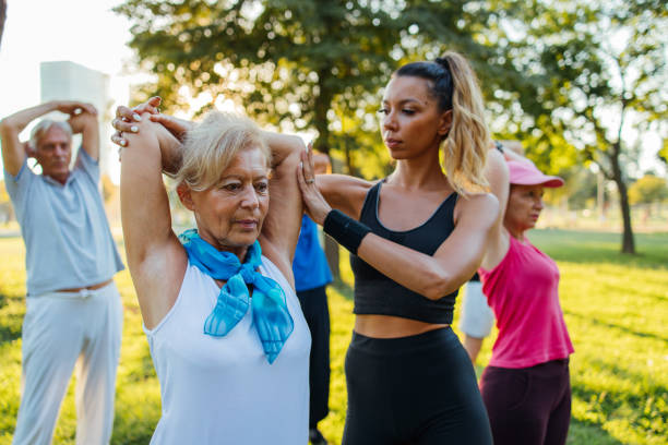 istock Senior people are exercising with instructor 1266937977