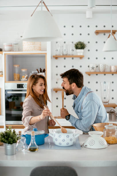 istock Couple in kitchen stock photo 1266937980