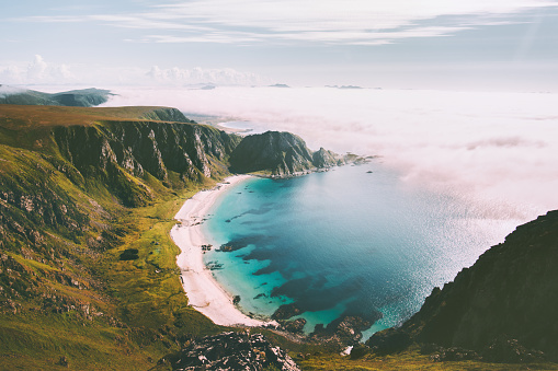 Sea beach landscape in Norway idyllic aerial view summer travel vacations nature scenery seaside and mountains
