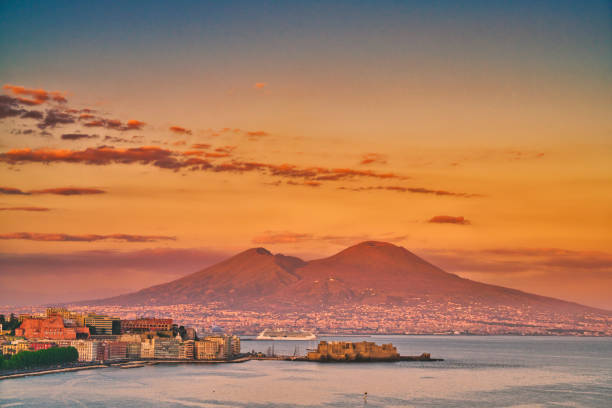 Vesuvio - Naples - Castel dell'Ovo - Italy Beautiful sunset over the Bay of Naples with the Castel dell'Ovo in front of the famous Mt. Vesuvio. The Castel dell' Ovo is the oldest standing fortification in Naples. naples italy photos stock pictures, royalty-free photos & images