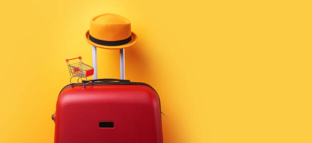 istock suitcase with shopping cart 1266946311