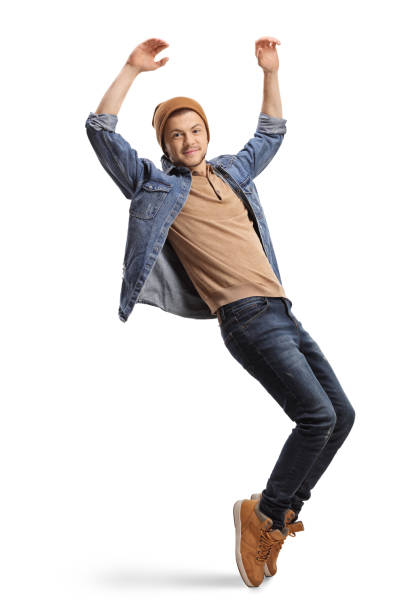istock Guy in casual wear dancing and raising hands up 1266951947