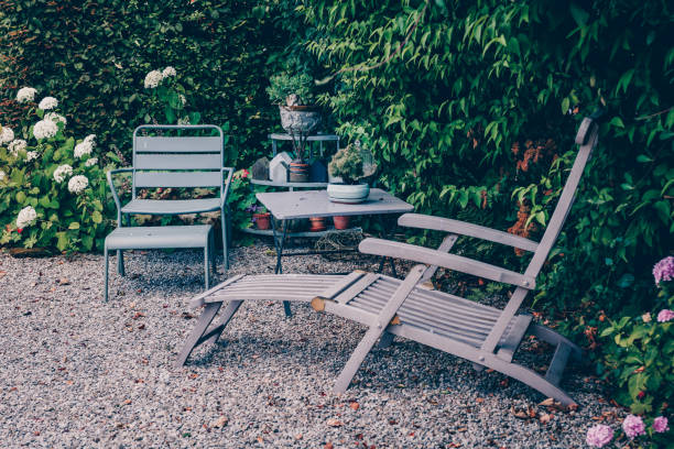 Long chair and table in the garden. High quality photo