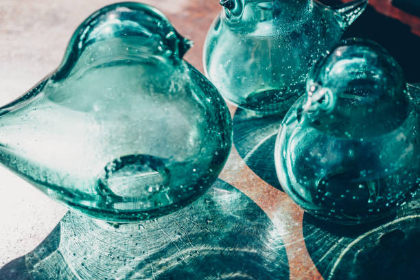 istock Decorative objects in blown glass on a table outdoor 1266953924