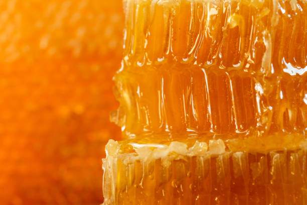 istock organic honey and rustic bread on a old wooden table. Healthy eating breakfast. 1266955019
