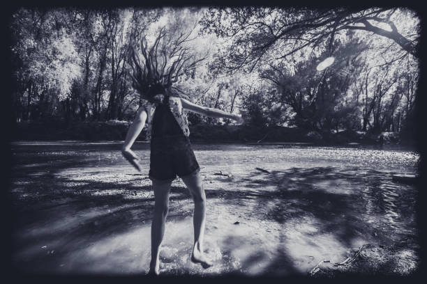 istock dramatic jump into the water monochrome 1266955959