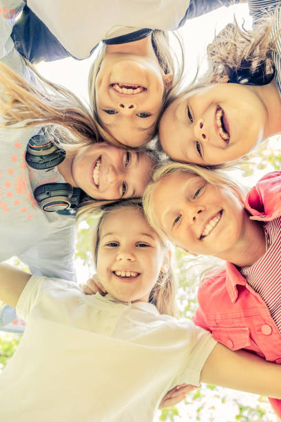 istock Smiling Kids outdoors 1266956153