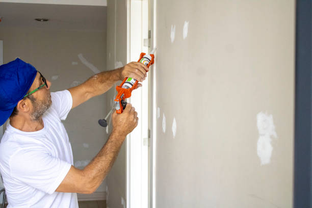 istock old man repairing his home 1266956438