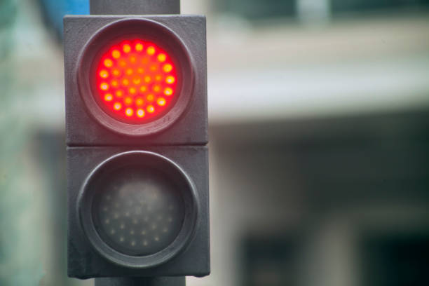 istock Small red traffic light for pedestrians. 1266956454