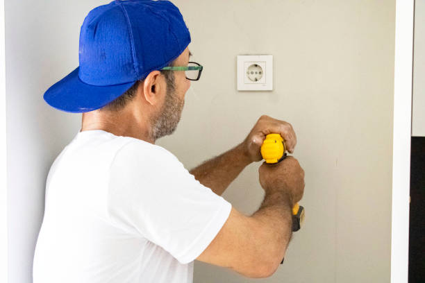 istock old man repairing his home 1266956475