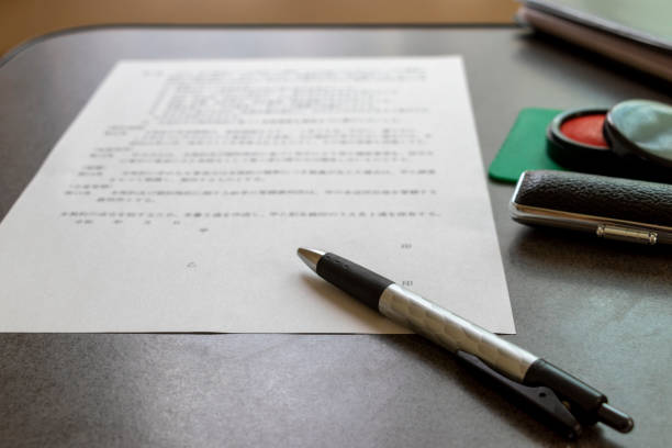istock Signature and sealing to document 1266957372