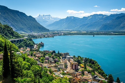 Aerial view of Geneva lake with Swiss Alps panorama from Montreux to Villeneuve and Chillon castle in Veytaux city Vaud Switzerland