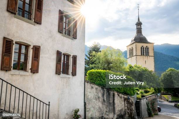 Bell Tower Of Saint Theodule Church In Gruyeres Medieval Village At Sunrise In La Gruyere Fribourg Switzerland Stock Photo - Download Image Now