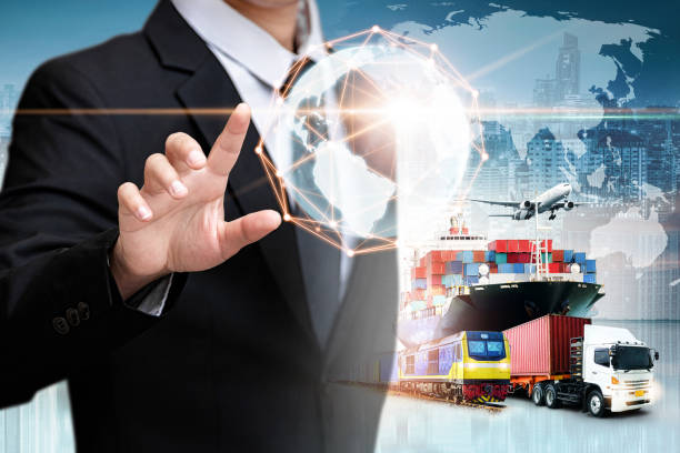 istock Businessman holding digital globe in palm for logistics import export background and container cargo freight ship transport concept 1266958611