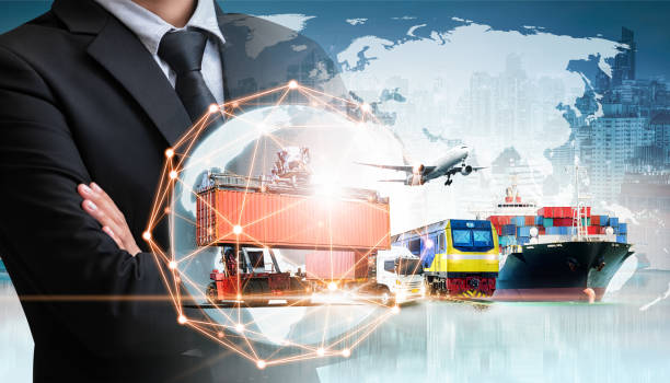 istock Businessman holding digital globe in palm for logistics import export background and container cargo freight ship transport concept 1266958770