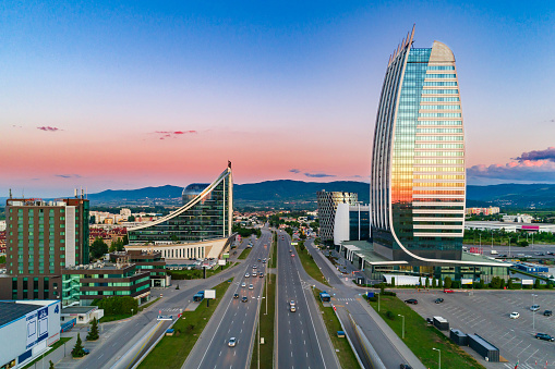 Aerial view of financial business district at sunset, Sofia, Bulgaria. The scene takes place near financial and industrial district near or short after sunset outdoors in the city of Sofia, Bulgaria (Eastern Europe). The footage is taken with DJI Phantom 4 Pro video drone / quadcopter.
