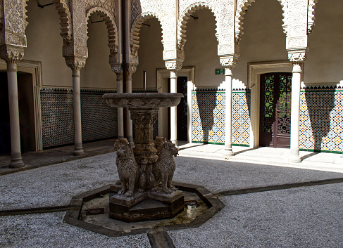 Grizzana Morandi / Bologna, Italy - August 13, 2020: Cortile dei leoni (Courtyard of the lions) inspired by  the Alhambra in Granada.