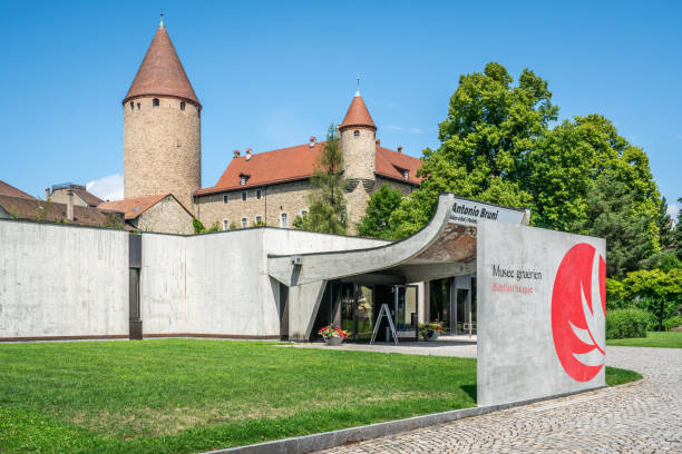 Entrance of the Musee Gruerien or Gruerien museum and castle in background in Bulle La Gruyere Switzerland Bulle Switzerland , 27 June 2020 : Entrance of the Musee Gruerien or Gruerien museum and castle in background in Bulle La Gruyere Switzerland bulle stock pictures, royalty-free photos & images