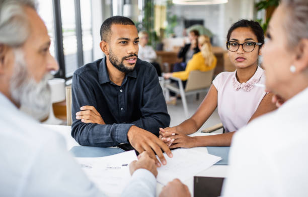 istock Business people having a meeting 1266961569