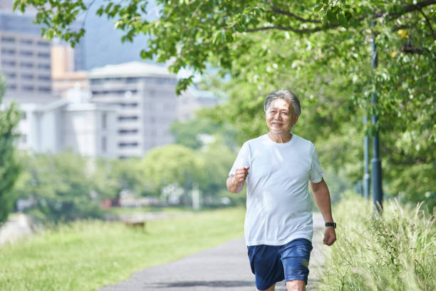 Senior man exercising in the green
