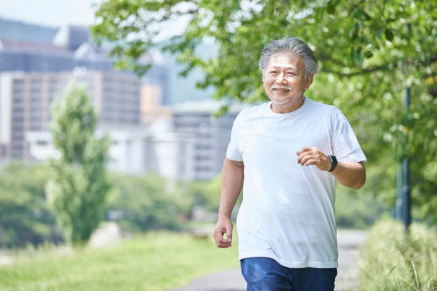 istock Senior man exercising in the green 1266962985
