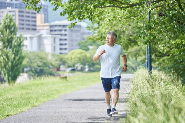 istock Senior man exercising in the green 1266962989