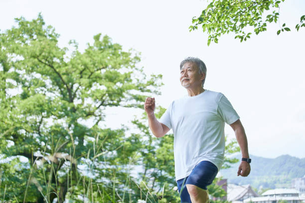 istock Senior man exercising in the green 1266963014