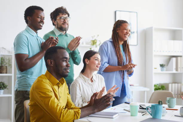 istock Diverse Business Team Applauding 1266963367