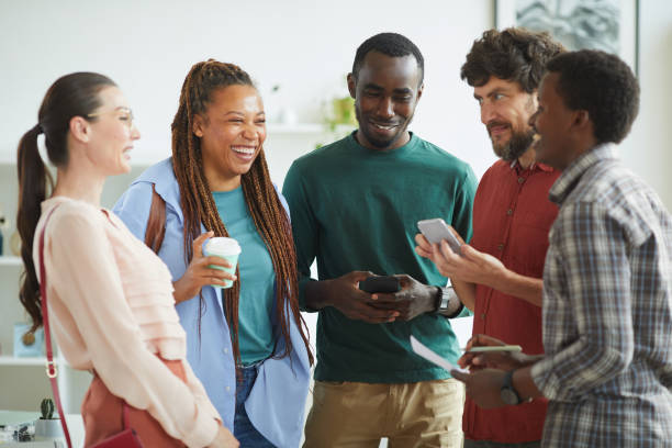 istock Diverse Business Team Laughing Emotionally 1266963395