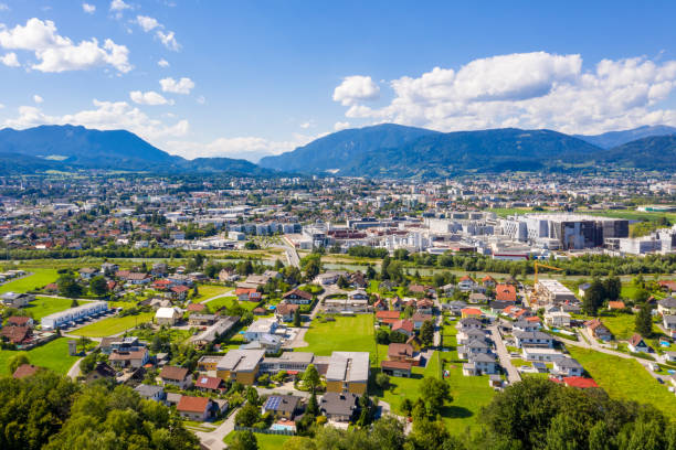 Villach in Carinthia, panorama view. Small town in the South of Austria, Europe. Villach in Carinthia. Aerial panoramic view to the small famous town and the Drau river in the South of Austria during summer. villach stock pictures, royalty-free photos & images