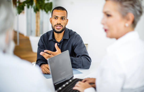 istock Business people having a meeting 1266964816